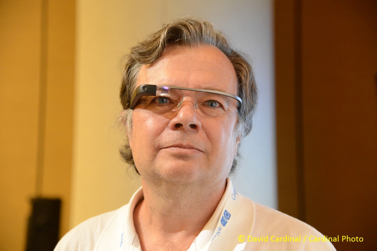 David Cardinal trying on Sergey Brin's Google Glass prototype at Google I/O 2012